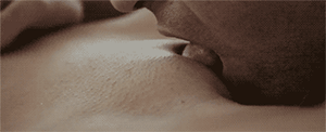 Tongue licking a woman's vulva during cunnilingus