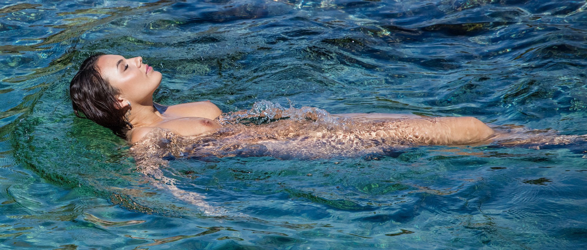 Sensual illicit thrill of naked skinny dipping